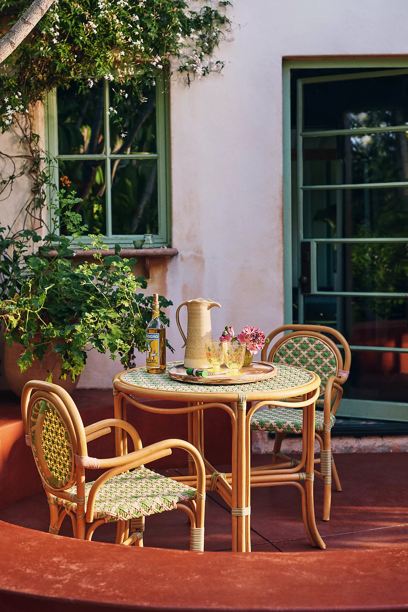 Coastal Rattan Indoor/Outdoor Bistro Table | Anthropologie (US)