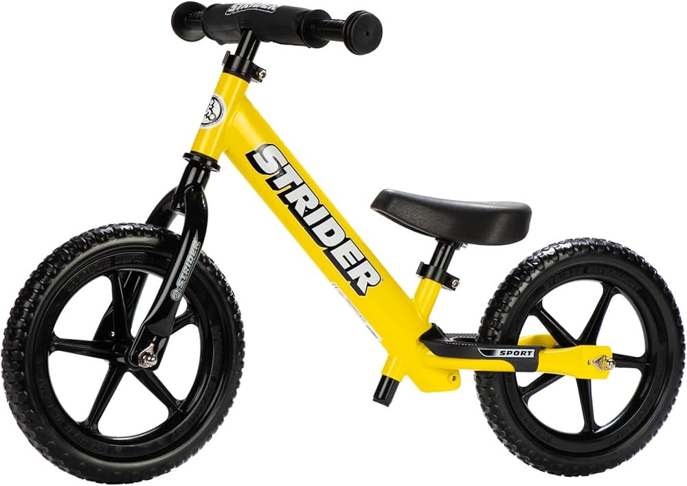 Strider 12” Sport Bike - No Pedal Balance Bicycle for Kids 1 to 4 Years - Includes Safety Pad, ... | Amazon (US)