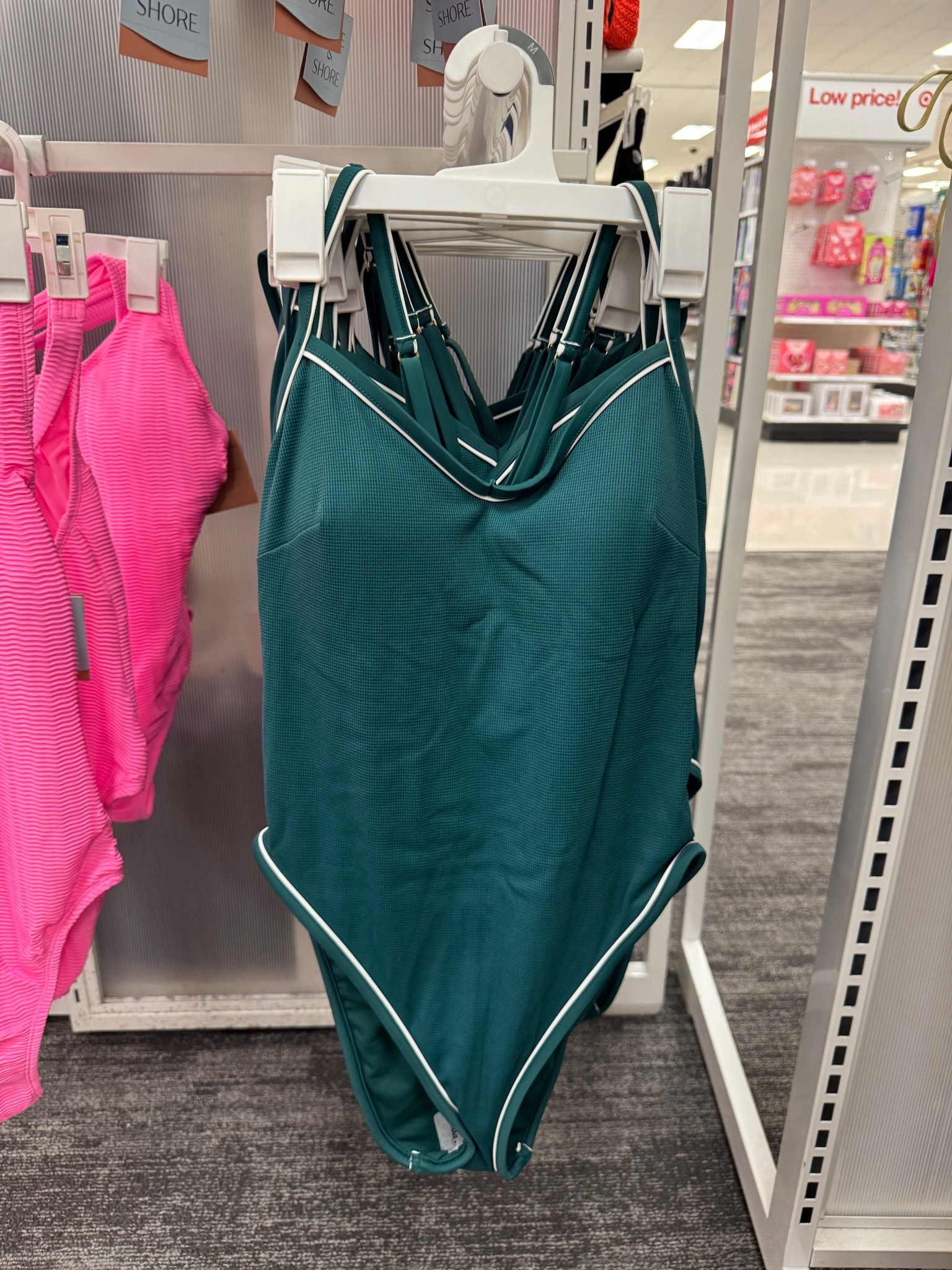 Long this simple green one piece swim suit with the white piping trim! So chic! 



#LTKmomlife #LTKOver40