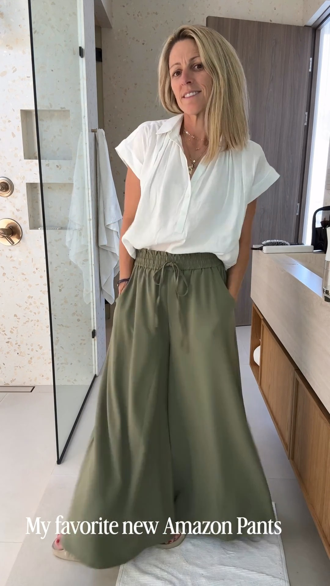 Obsessed with these pants as an understatement. After trying on numerous wide leg pants from Amazon I found the ones. It’s almost like you’re wearing a long skirt. And this is a great basic button-down. 

#ResortOutfit #VacationOutfit #AmazonStyle #AmazonFINDs #amazonPants ￼

#LTKOver40 #LTKSeasonal #LTKootd