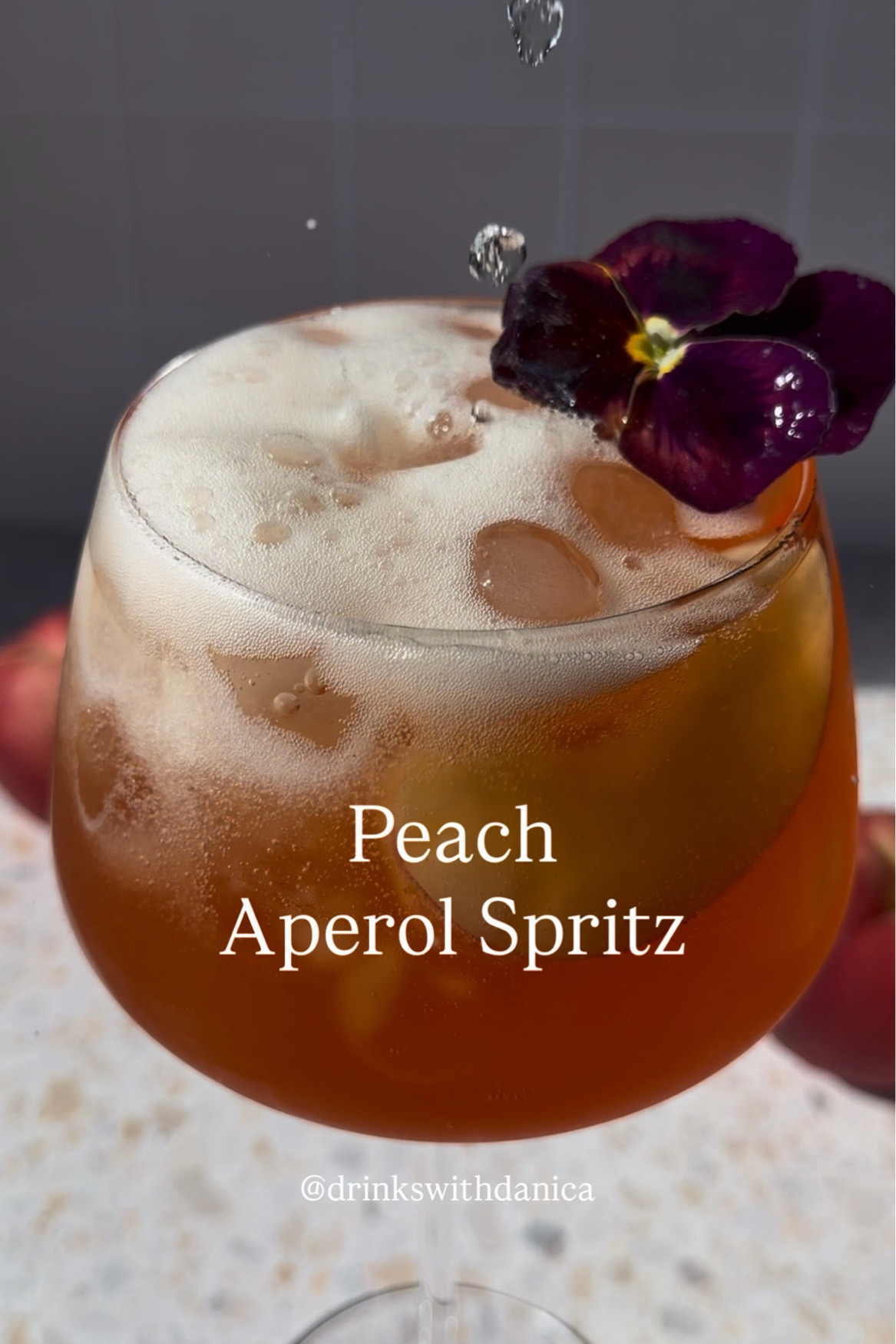 Peach Aperol Spritz

Follow me on Instagram and TikTok @drinkswithdanica for this recipe and more 