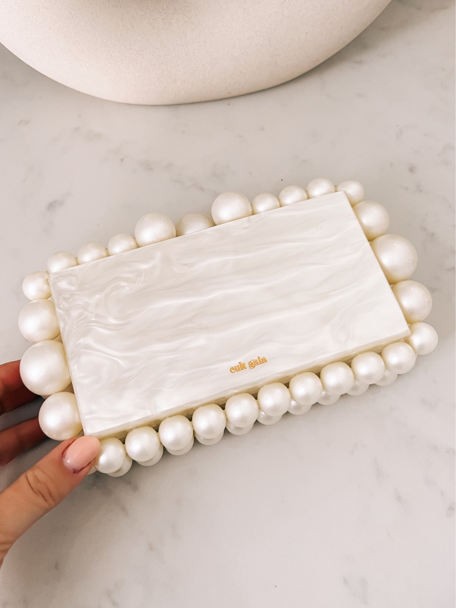 My Cult Gaia clutch on sale in other colors! 

#LTKSale #LTKitbag #LTKsalealert