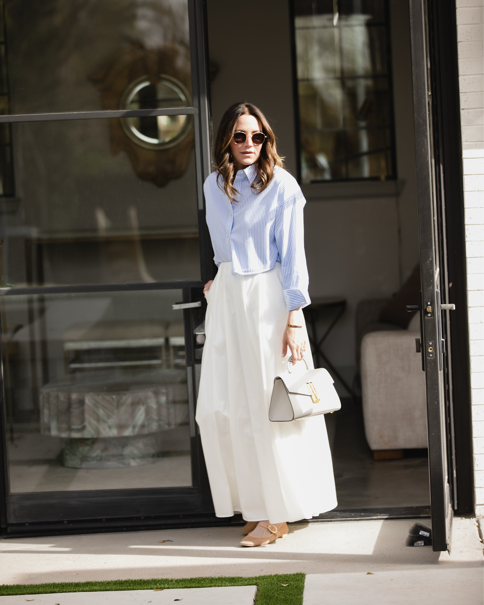 5 ways to style my favorite white poplin skirt currently on sale

#LTKWatchNow #LTKOver40 #LTKSaleAlert