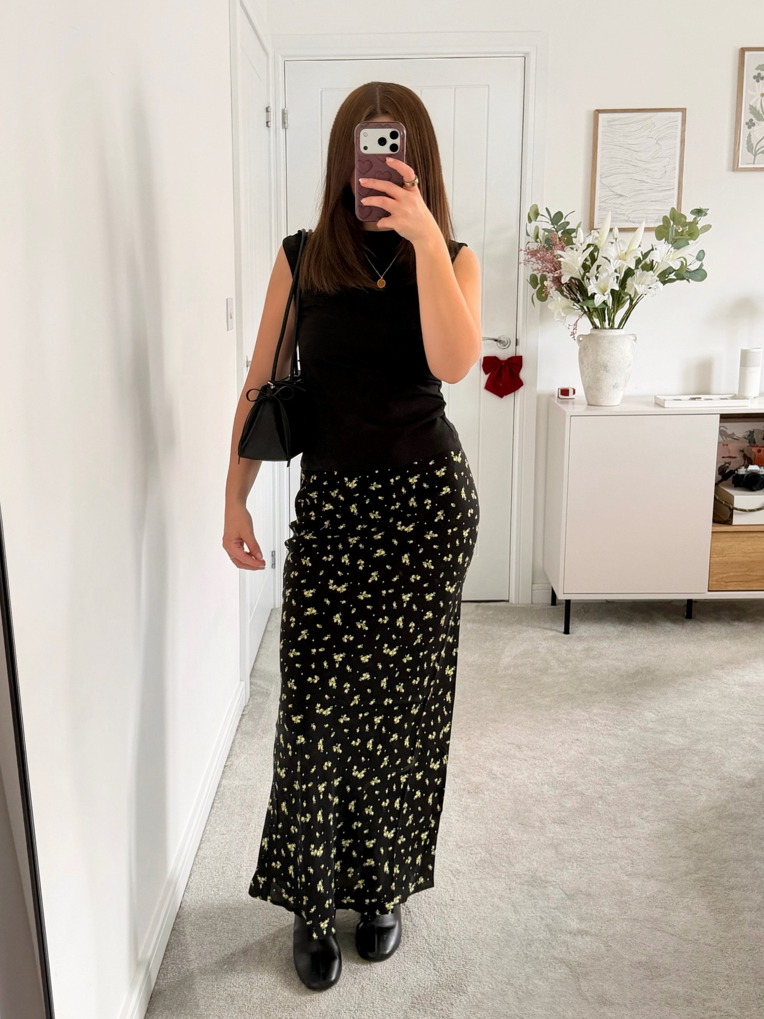 Bank holiday weekend brunch outfit ✨

I am 5ft 1 for reference 

• black floral butter yellow lemon bias cut midi maxi skirt black high neck top heeled boots pub uk outfits holiday city break outfit date night outfit summer spring petite fashion •

#LTKspring #LTKuk #LTKdatenight