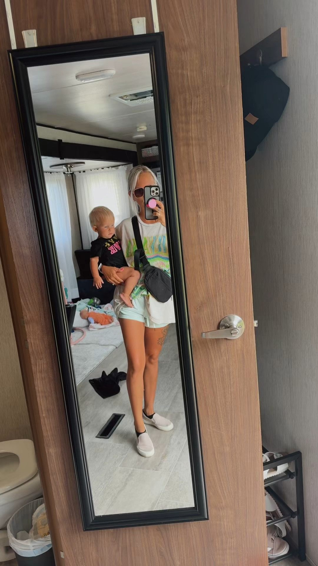 Comfy graphic tee outfit! 
For reference I am 4’11” / 110lbs. I usually am a small / 0-2. 
Graphic tee- large 
Shorts- small 
#LTKcomfort 
#graphictee 
