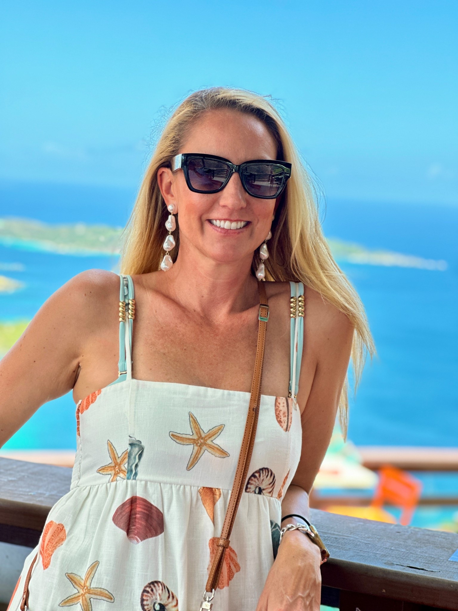 This cute shell summer maxi dress was purchased this summer from Vici Collection….but it’s no longer available! Check out some other options. Earrings a preorder from Vici, purse, Hermes, and sunnies from Diff.

Swimsuit underneath is from Amazon. 