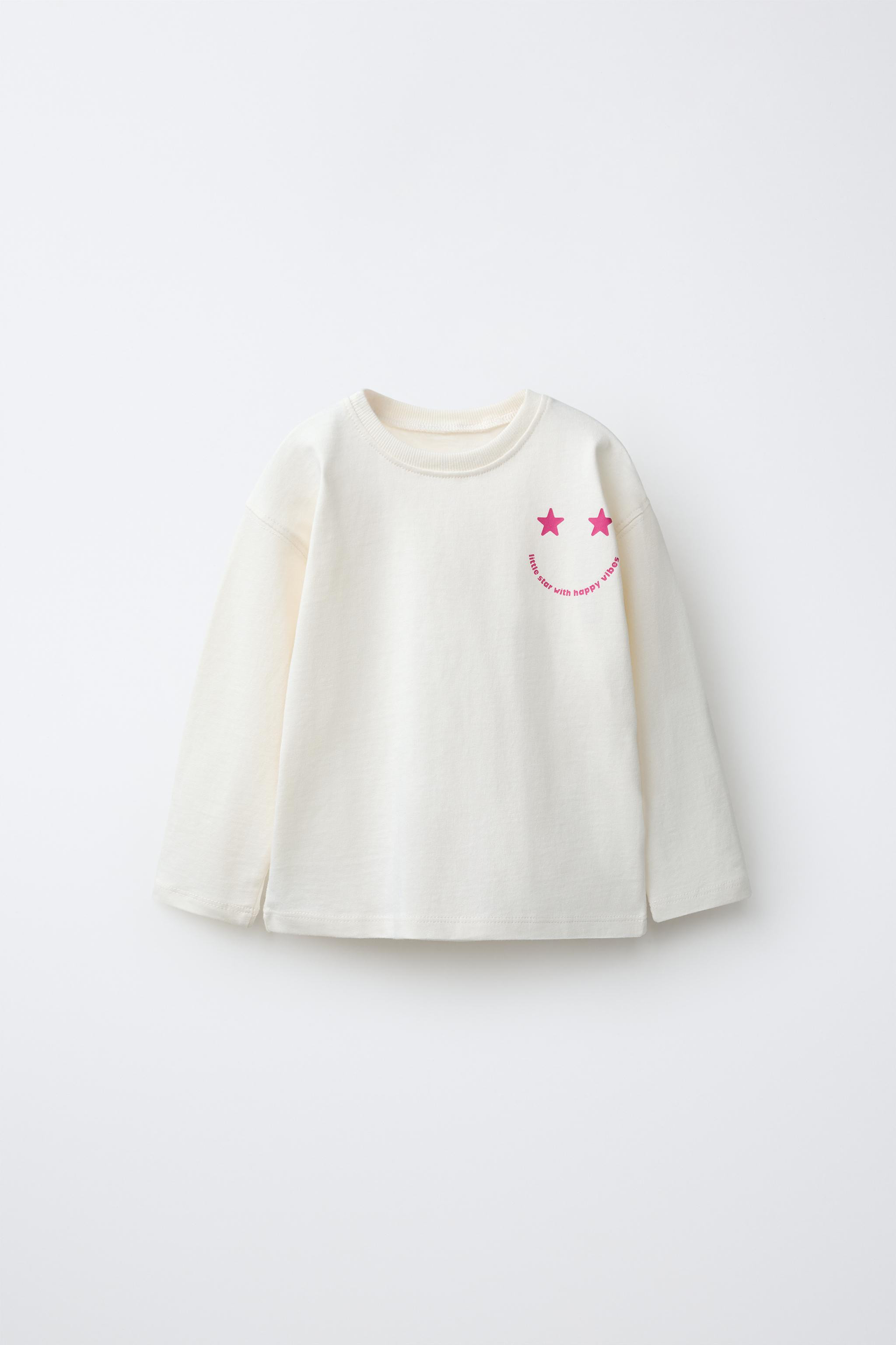 Round neck long sleeve T-shirt. Print on the chest and back. | Zara US