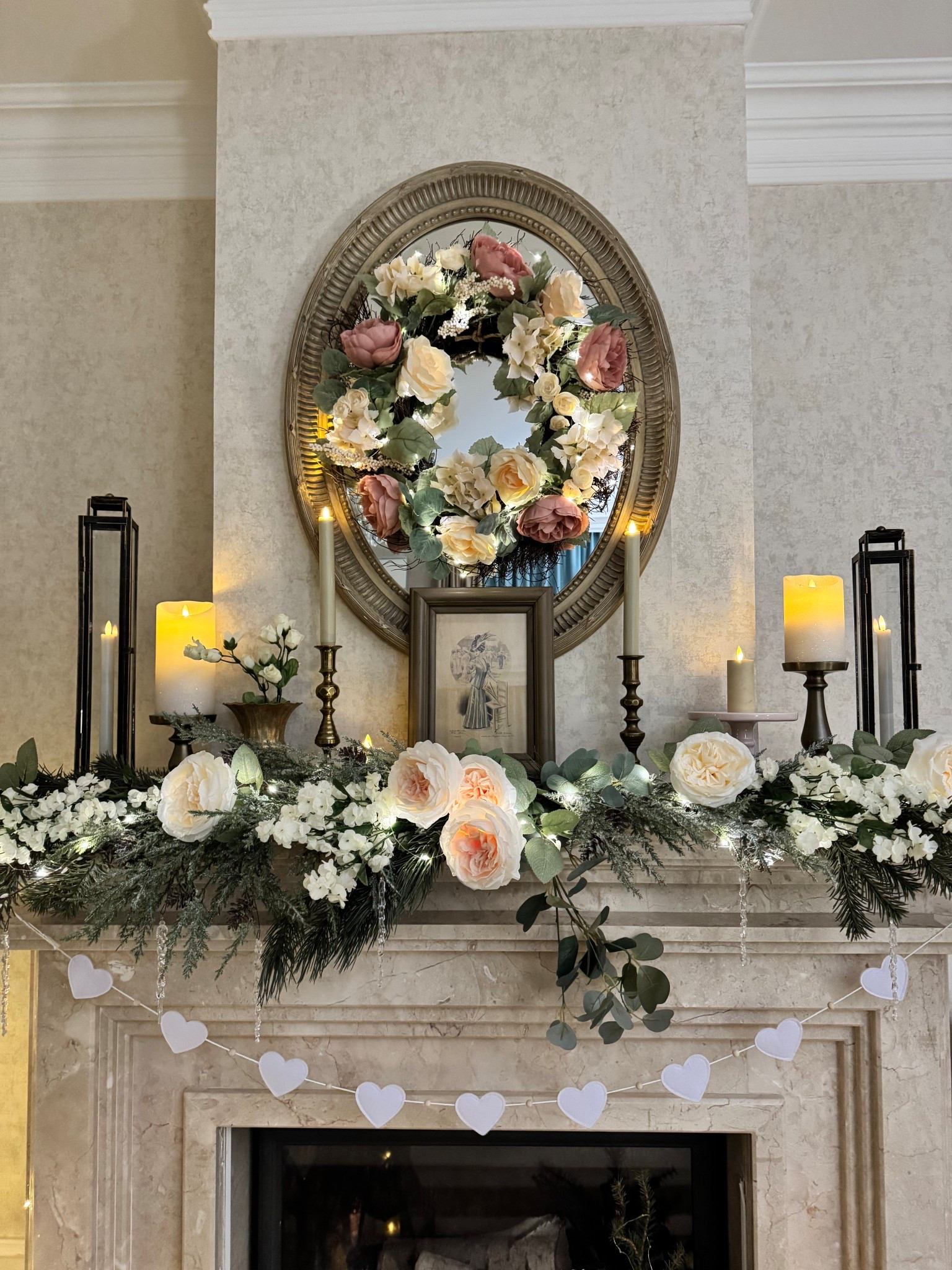 Valentine’s Day decor, heart garland, Valentine’s Day living room mantel, @Michaels faux roses, Luminara candles 

#LTKValentine #LTKSaleAlert #LTKHome