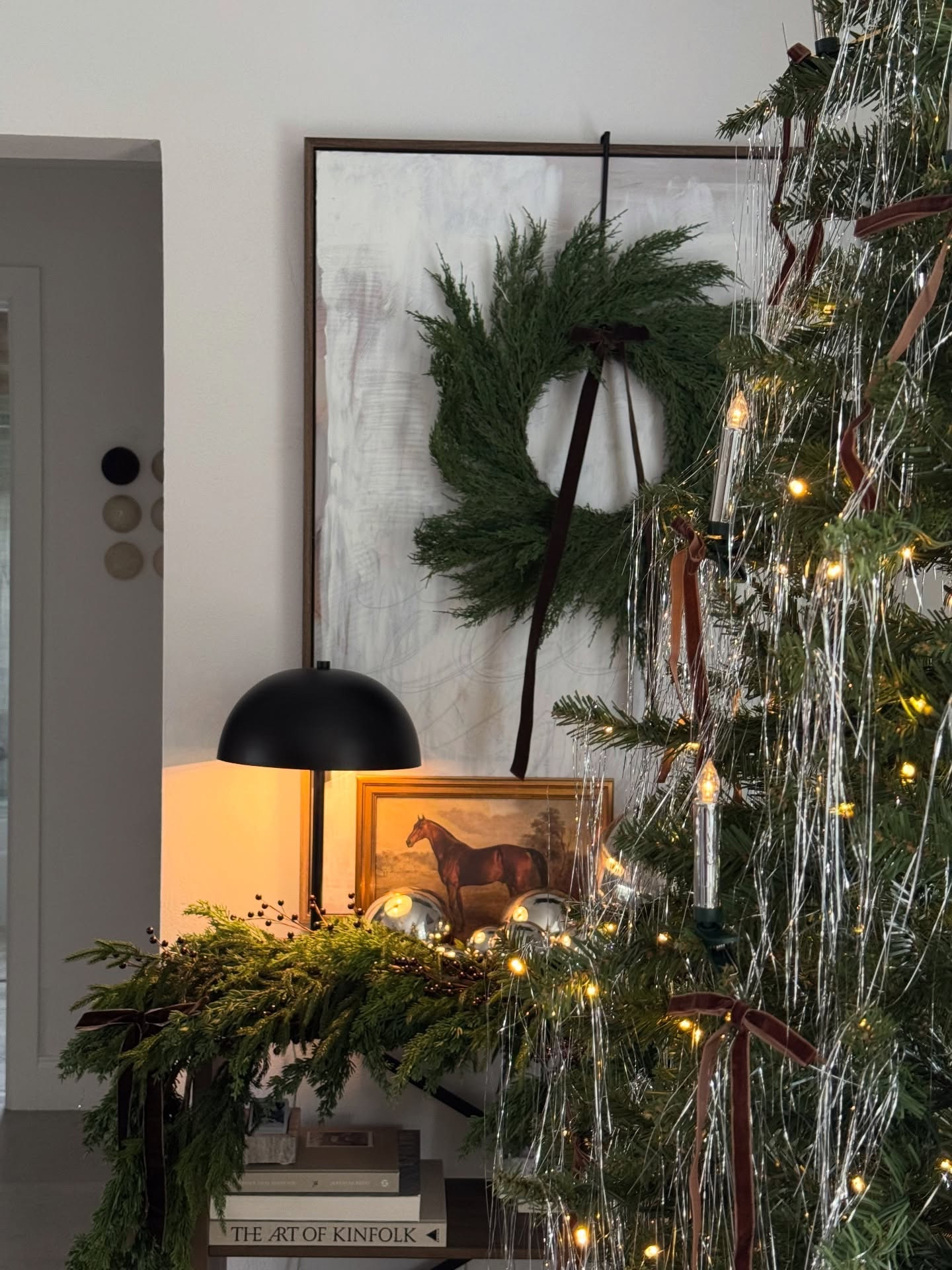 Tonight’s little pocket of calm ✨
I’m still obsessed with how this console came together — the garland, the silver, the art… it just feels collected and cozy in the best way 🐴✨🤎


#holidayhomedecor #christmasdecorideas #cozychristmasvibes #homefortheholidays #greengarland #silverdecor #collectedhome #neutralchristmasdecor #holidaystyling #christmasinspo #styledconsole #classicchristmasstyle

#LTKSeasonal #LTKHome #LTKHoliday