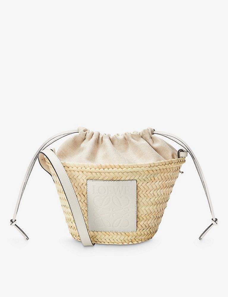 Loewe Paula’s Ibiza Anagram-patch raffia and leather bucket bag | Selfridges