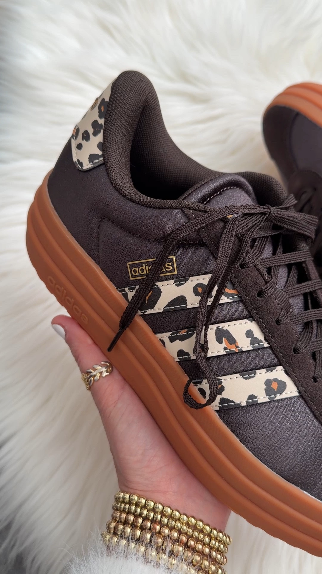 Adidas leopard sneakers now $56 originally $80. Go down a half size