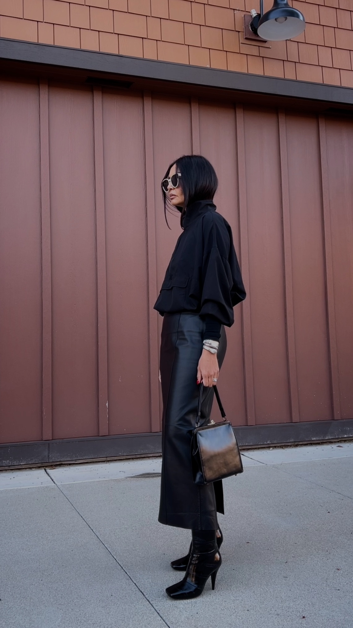 I liked similar windbreakers and purses, mine are old.
Linking exact skirt and boots. My skirt is size large.#LTKCyberWeek 

#LTKootd #LTKOver40