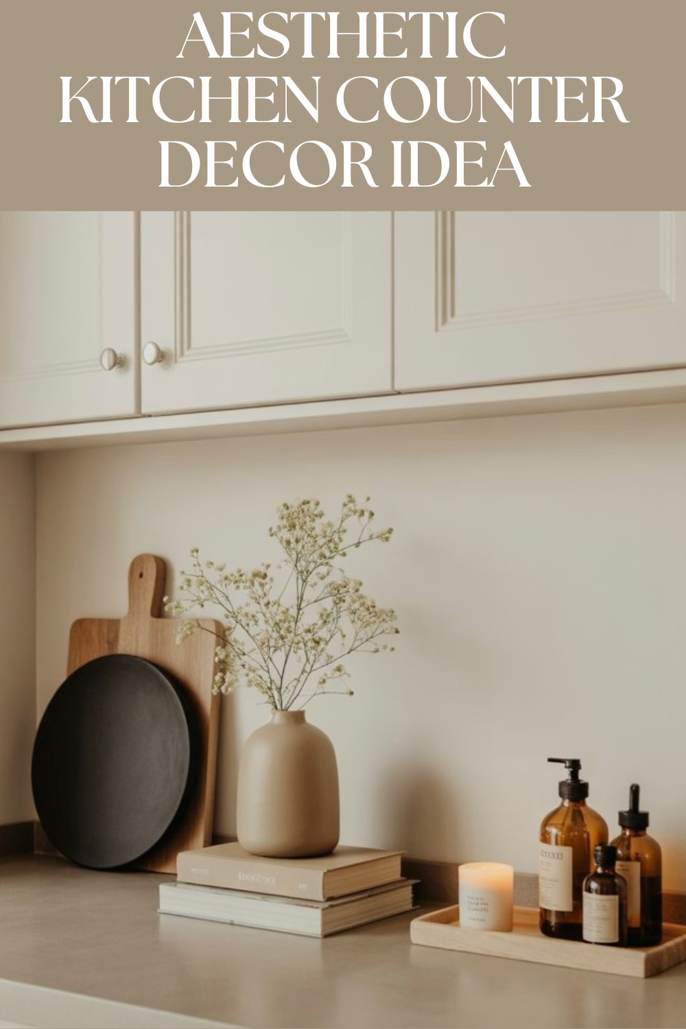 Aesthetic Kitchen Counter Decor Idea

This aesthetic kitchen counter decor idea shows how simple styling can instantly elevate your everyday kitchen. Neutral kitchen decor elements like ceramic vases, wooden cutting boards, stacked books, soft florals, candles, and amber glass bottles create a calm, cozy, and modern look. Perfect for minimalist kitchens, warm neutral interiors, and anyone who loves a clean, uncluttered kitchen counter that still feels stylish and inviting.
aesthetic kitchen counter decor, kitchen counter decor idea, neutral kitchen decor, beige kitchen decor, minimalist kitchen styling, cozy kitchen decor, modern kitchen counter, warm neutral home decor, kitchen styling inspiration, clean kitchen aesthetic, Scandinavian kitchen decor, everyday kitchen decor ideas, espresso brown, coffee bar 

 #LTKGiftGuide 

#LTKHome #LTKSaleAlert