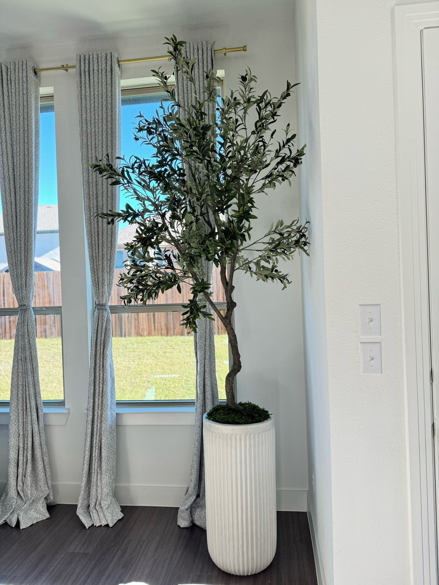 The most realistic 8 foot tall olive tree there is!! Unfortunately, it’s out of stock but I have added a similar style from the same vendor. 
Planter is from Pottery Barn and it is HUGE! My ceiling is 13 foot tall and I wanted something that’s just as magnificent!

#LTKCyberWeek #LTKhome #LTKover40