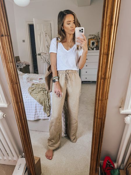 • linen pants linked are exact; the color I have just isn’t available in the US 
• top is also available in a crew neck version if that’s more you; super lightweight and breezyy

#LTKFindsUnder50 #LTKFindsUnder100