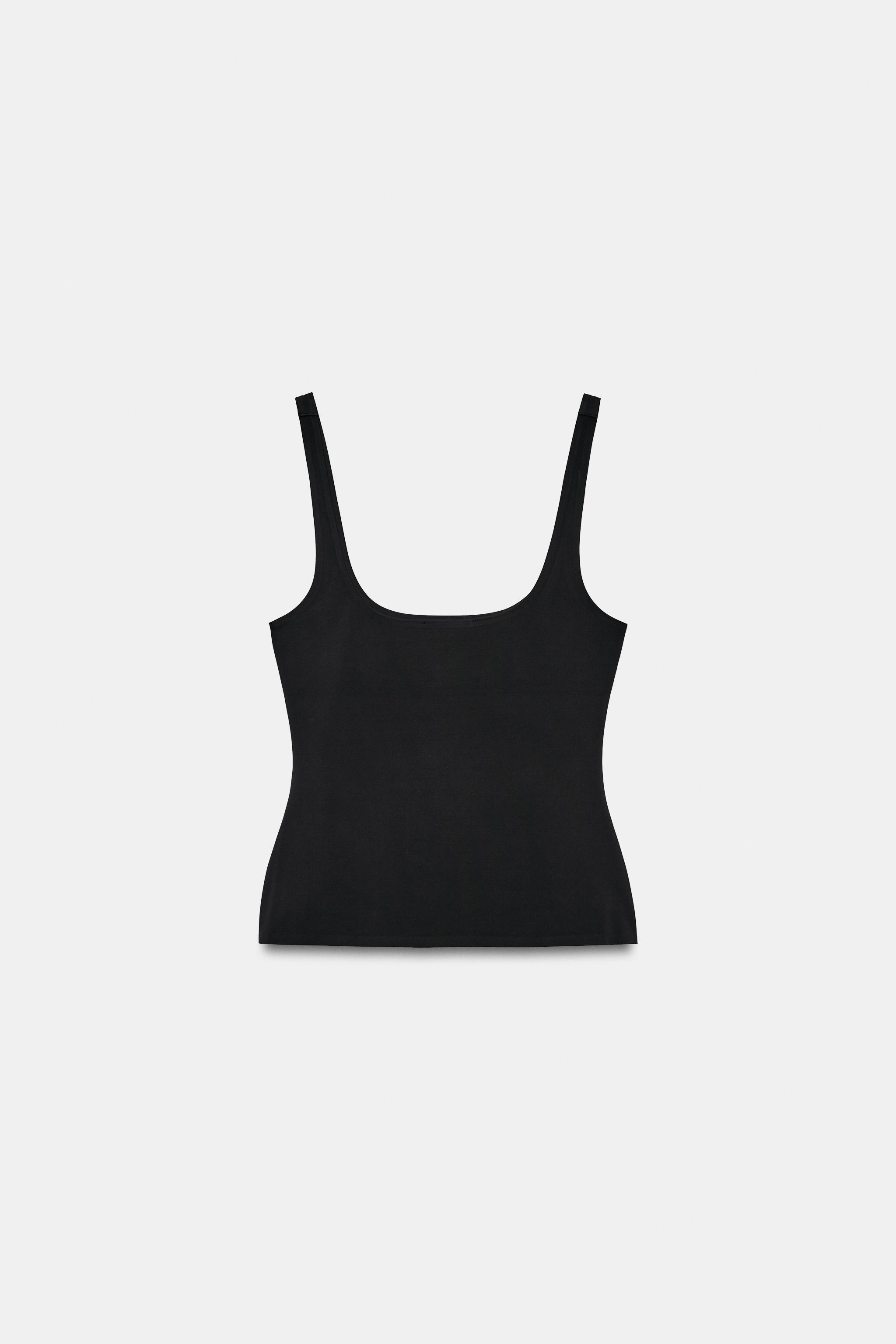 Sleeveless top crafted from a polyamide blend. Featuring a round neckline, delicate spaghetti str... | Zara US