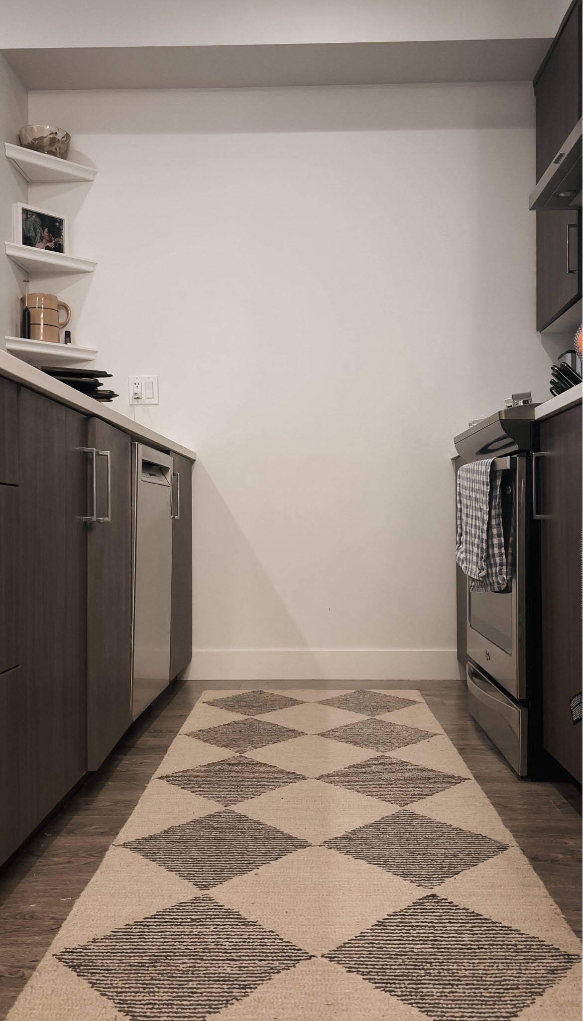 Sale alert! 🚨 My Chris Loves Julia x Loloi Francis Wool rug is on sale right now for 50% off. That’s right, this kitchen runner is $50 (from $100). I’m obsessed with the checkered design, thick material, and modern organic style. Love, love, love this rug! It also comes in other sizes and would make a great transitional, living room rug, bedroom rug, home office rug, or entryway rug. It has the most perfect modern traditional style. 

#LTKHome #LTKSaleAlert #LTKFindsUnder50