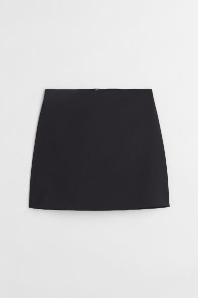 Conscious choice  New ArrivalMini skirt in woven fabric. Regular waist and concealed zipper at ba... | H&M (US + CA)