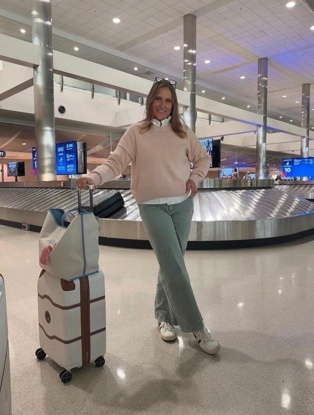 Travel day outfit we’re loving! We’re all about comfortable layers, relaxed jeans, and sneakers that make getting through the airport a little easier. This is the kind of travel outfit we’d happily wear from takeoff to touchdown.

#LTKSeasonal #LTKOver40 #LTKMidsize