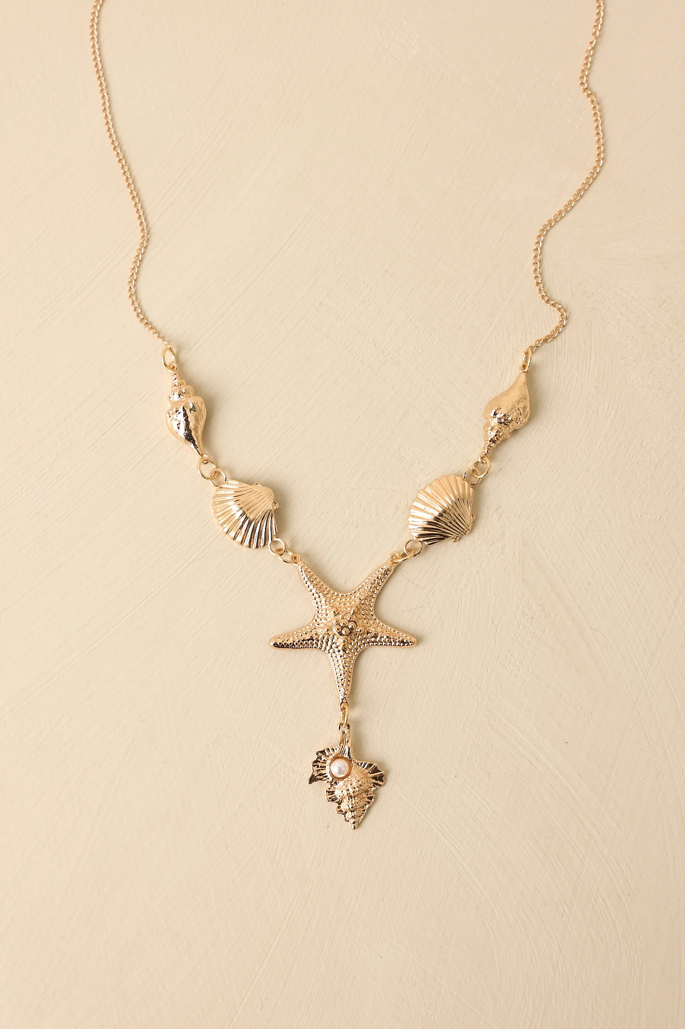 Ocean Glow Gold Multi Shell & Starfish Necklace | Red Dress
