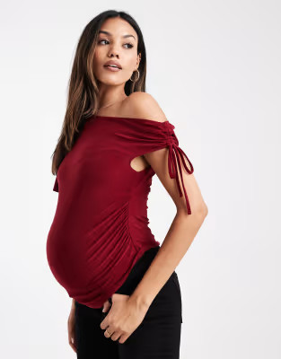 ASOS DESIGN Maternity asymmetric shoulder ruched slinky top in burgundy | ASOS (Global)
