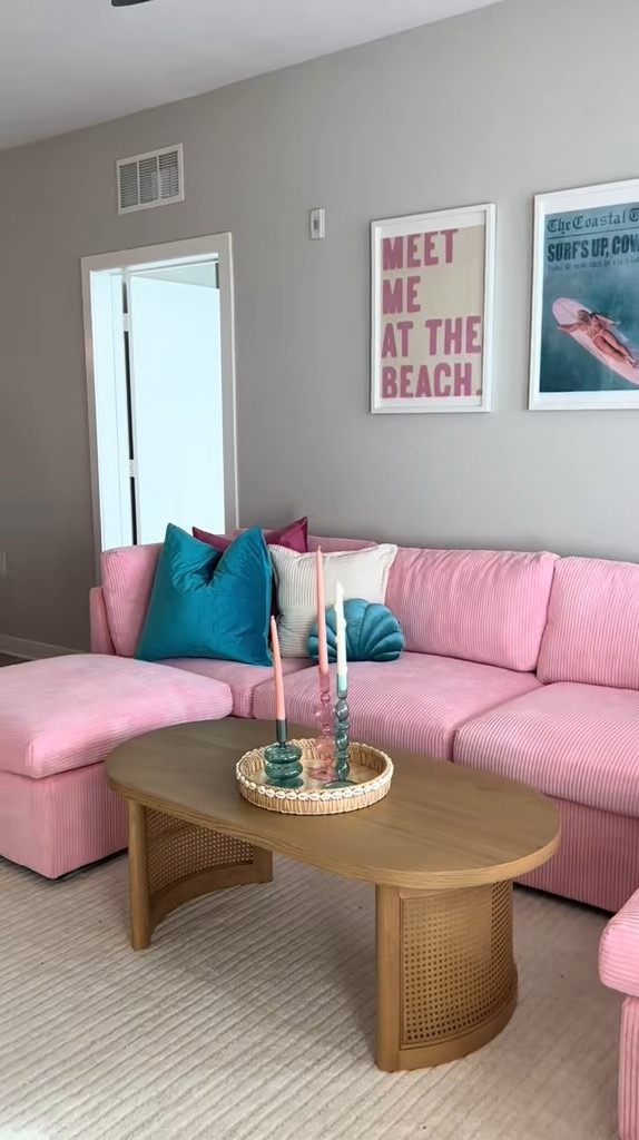 my pink Wayfair couch, living room furniture and surfer girl beach house wall decor 🌴💗