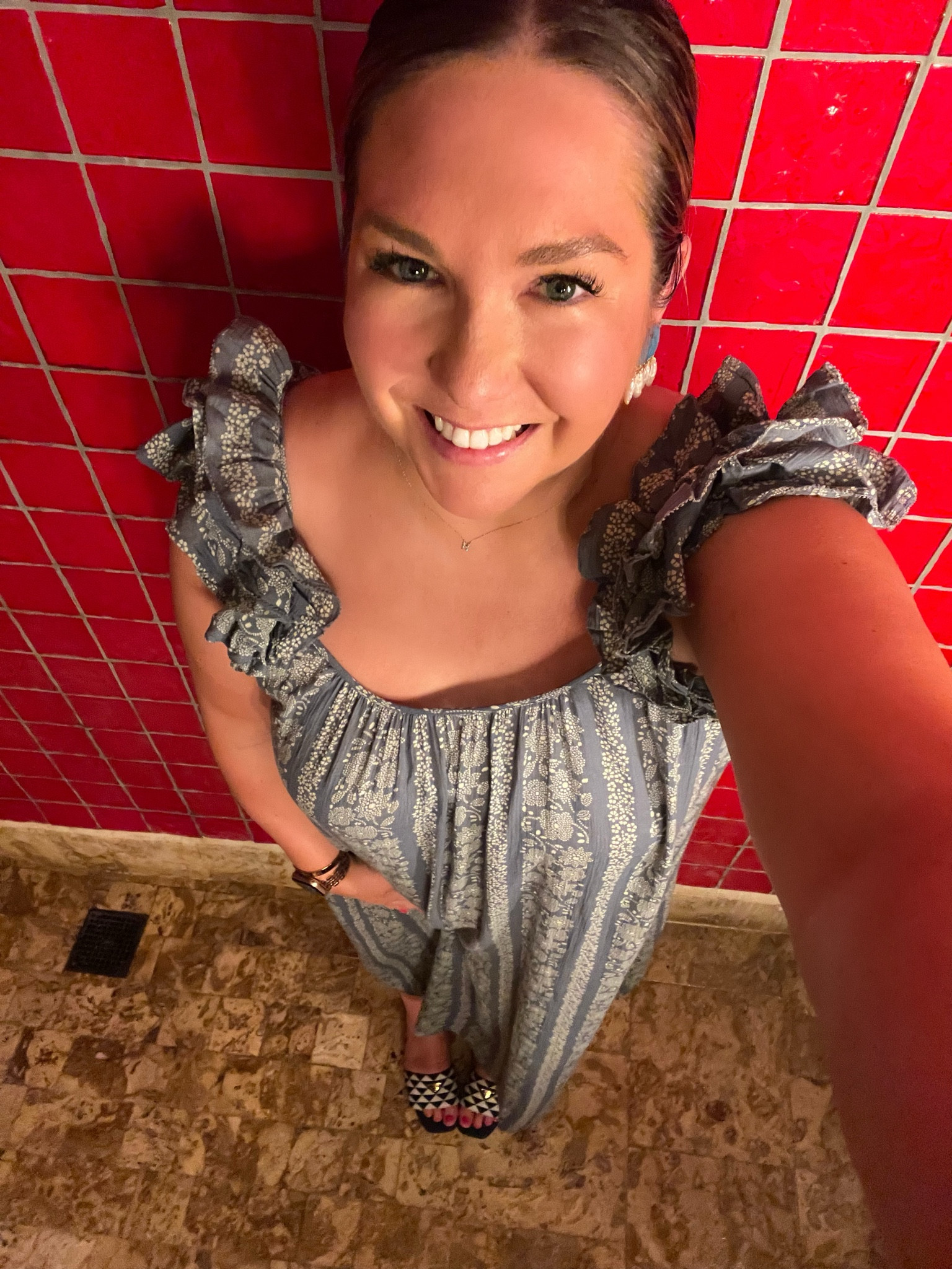 It’s going to be a hard time here getting a great light in the evening. However I couldn’t pass up taking a good photo of my outfit. This floral dress is so breezy and easy to wear. I paired it with a super fun statement earring because of the
ruffle shoulder. I’m also wear a fun blue and white print slide to round out the look! Perfect for our first night in St. Lucia!

#LTKshoecrush #LTKtravel #LTKSeasonal