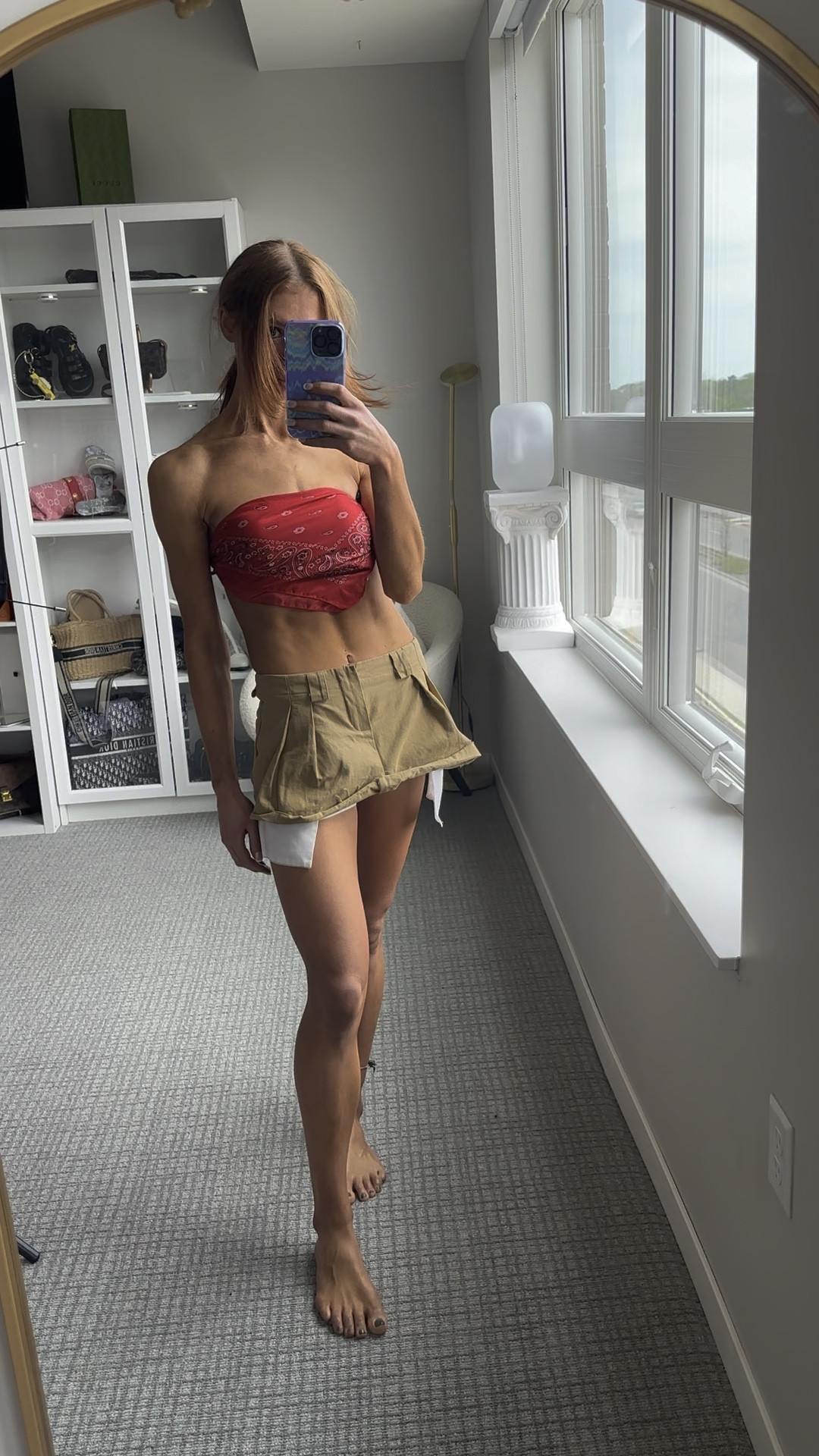  Bandana scarf top 
Cargo mini skirt 
Self tanner 
Baseball game look 


#LTKfit #LTKunder100 #LTKtravel