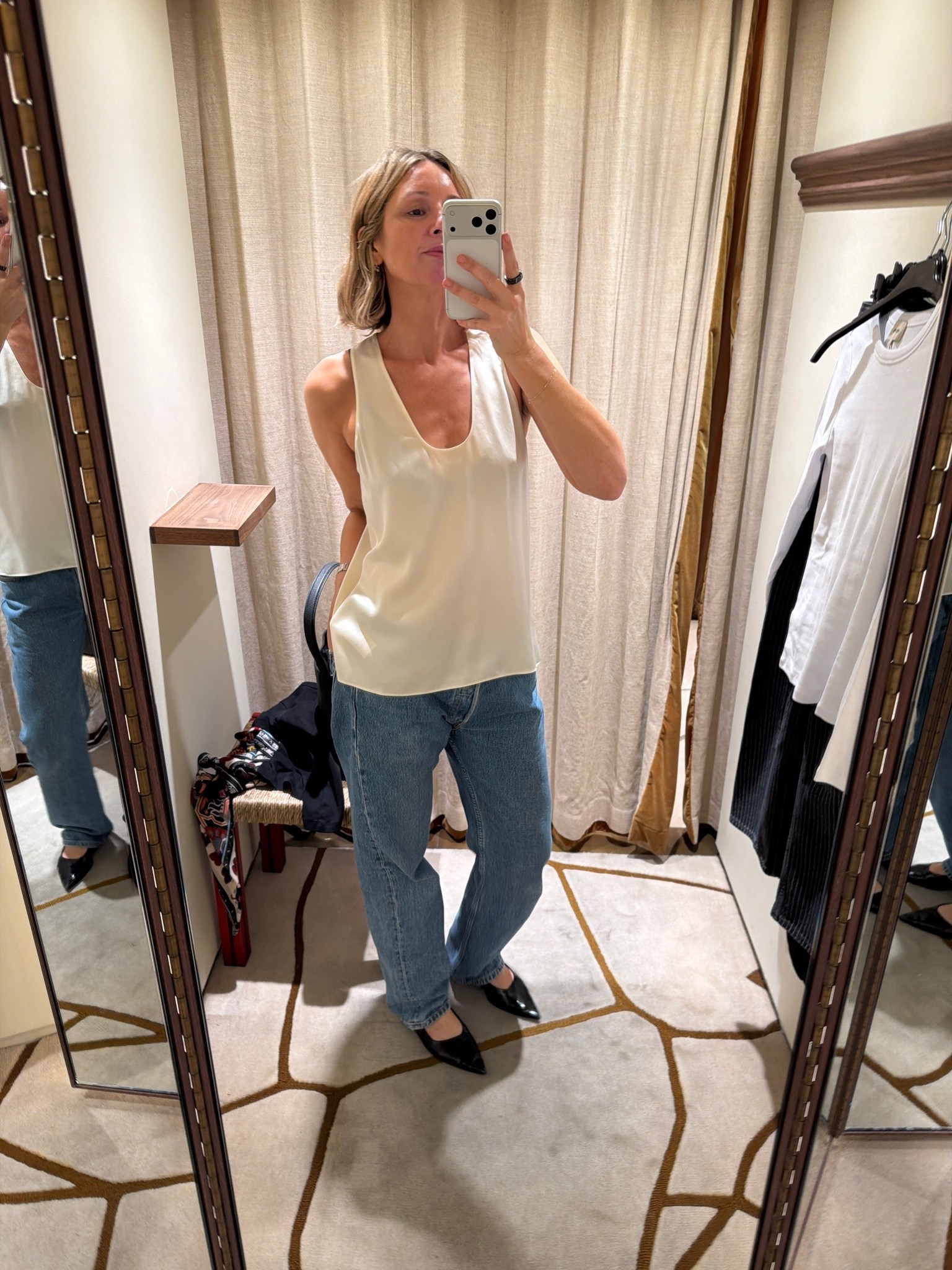ivory satin racerback top, silk tank top, straight leg jeans, mid wash denim, black pointed pumps, changing room try on, dressing room fit check, effortless casual, quiet luxury, elevated basics, minimalist off duty look, ltkstyletip, ltkseasonal, ltkfindsunder100, outfit inspo, capsule wardrobe essentials

#LTKautumn #LTKdatenight #LTKjeans