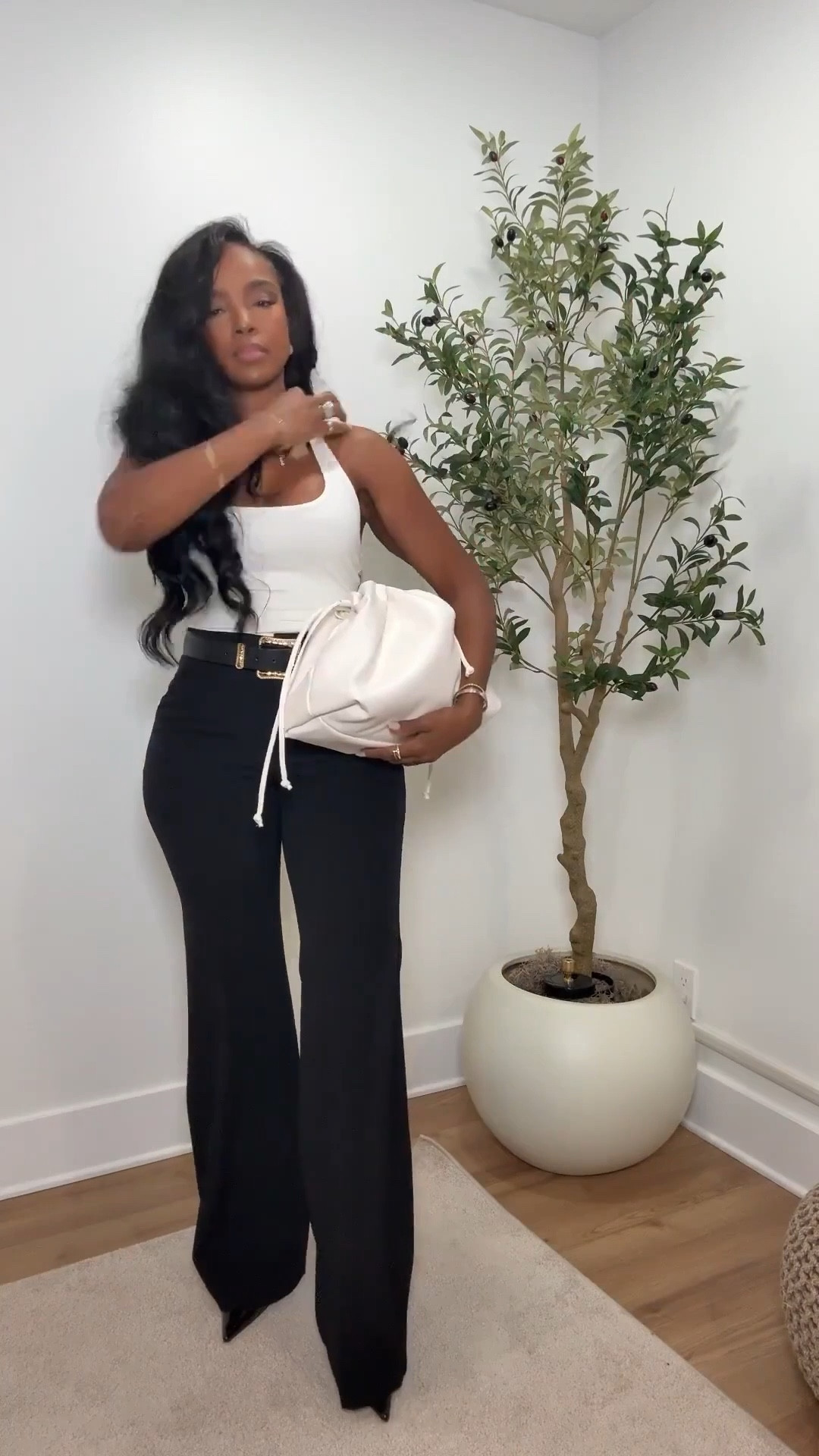 ✨ Effortless Everyday Elevation
Clean, classic, and endlessly wearable. This fitted white tank paired with tailored black pants creates a timeless silhouette that works for so many moments. Finished with a structured white bag and pointed-toe heels for a polished, elevated feel that never goes out of style.

Perfect for workdays, dinner plans, casual meetings, and chic everyday wear.

📏 Sizing: Tank (Small) • Pants (Small / 4 Long) • Heels (TTS) • Bag (One Size)  
Measurements: 5’4” · 138 lbs · 34D · 27” waist · 40” hips

Save this post for capsule wardrobe staples, elevated basics, classic black-and-white outfits, and chic everyday style inspiration.

Follow me on Instagram and YouTube @kirasfashionfinds

#LTKootd #LTKgrwm