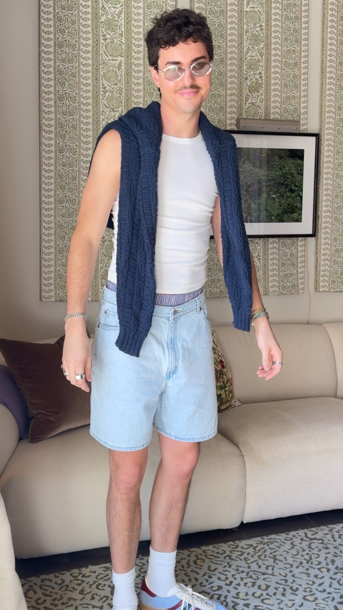 Men’s weekend outfit with Adidas Gazelle sneakers, light wash jean shorts, navy cableknit fisherman sweater, and Miu Miu silver designer sunglasses 

#LTKMens #LTKStyleTip