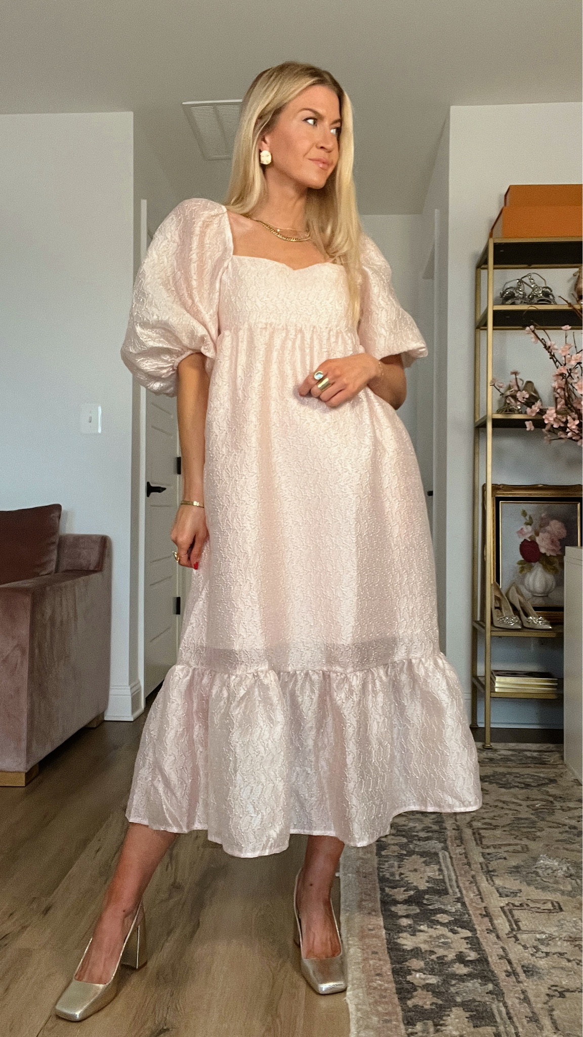 Light pink ruffle dress - wearing an XS runs large 

#LTKstyletip #LTKwedding #LTKSeasonal