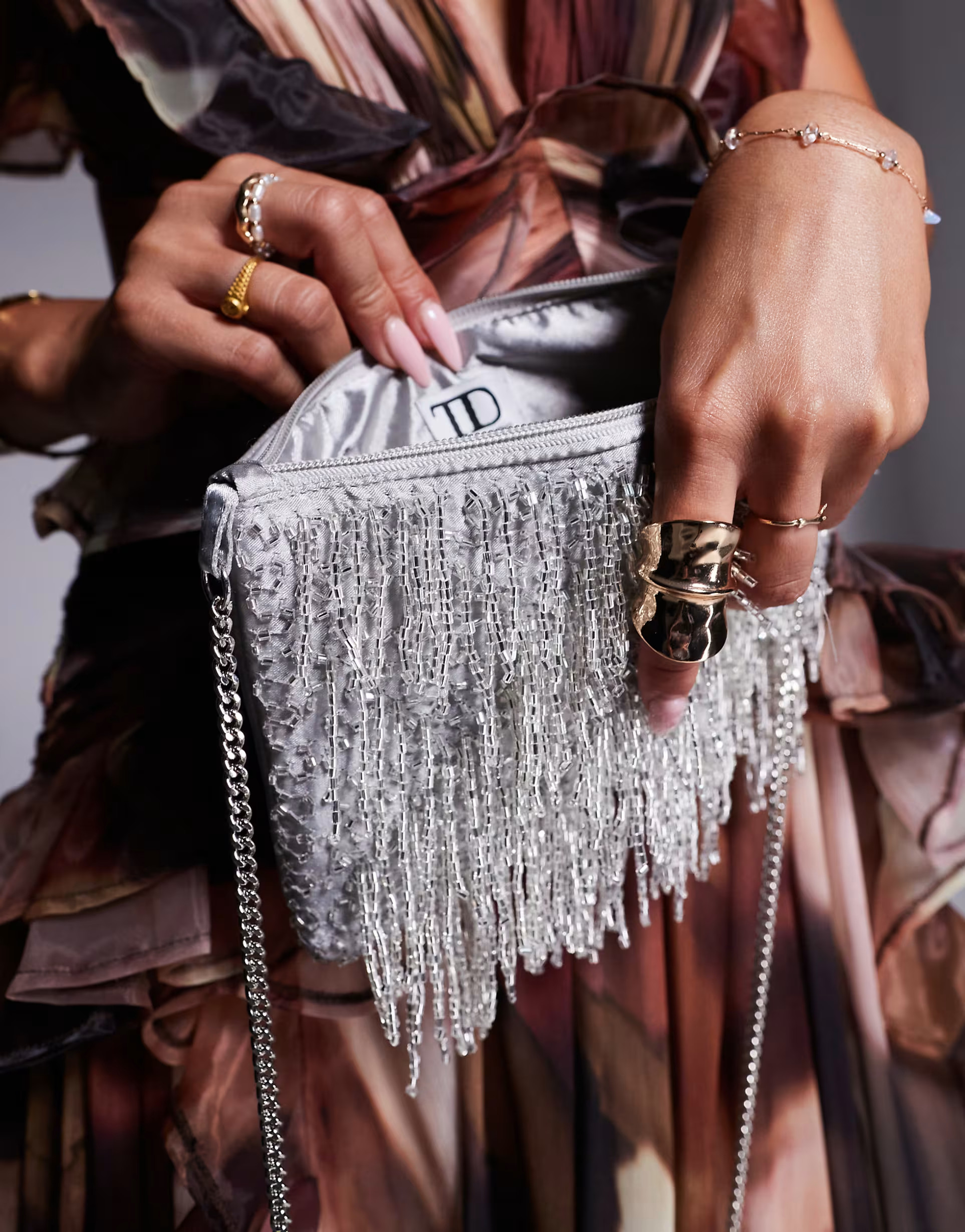 True Decadence embellished tassel clutch bag in silver | ASOS (Global)