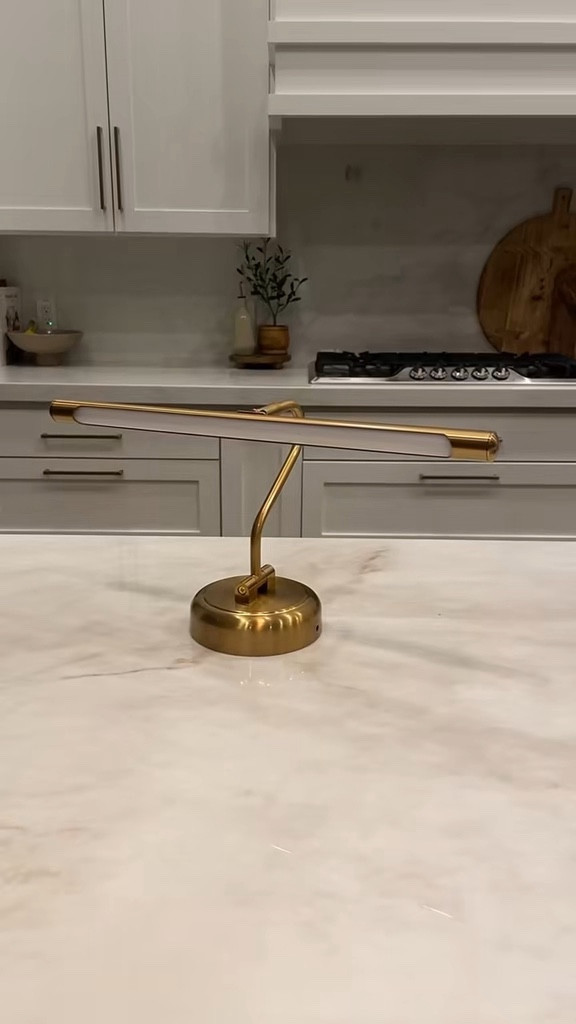 Brass picture light 

#LTKU #LTKMostLoved #LTKhome