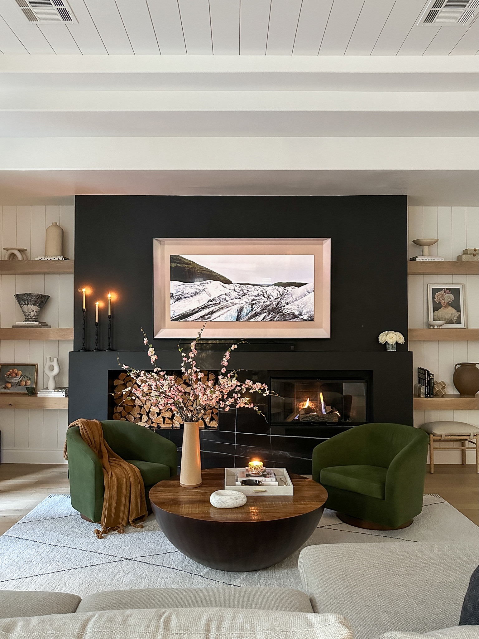 Living room 

Pink florals, green chairs, round wood coffee table 

#LTKfamily #LTKhome #LTKstyletip