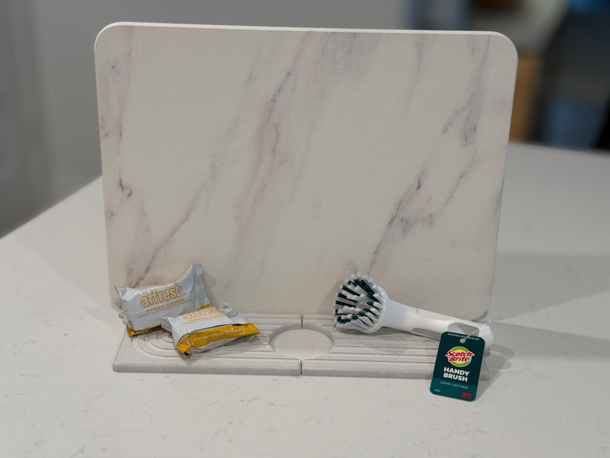 My kitchen sink must haves—this stone drying mat then blends seamlessly with your counters, these stone plates to go next to your faucets to catch all the dribbling water from your hands when turning the water on and off so you’re not constantly having to towel it up, some garbage disposal fresheners, and my favorite scrub brush!

#LTKHome #LTKGiftGuide #LTKdayinmylife