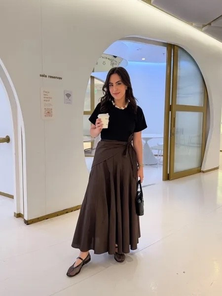 I am so into this brown midi skirt right now. It's my favorite for transitional days and I can already see myself wearing it with sweaters once it cools down! Wearing size 0 and also linked my favorite basic tee to go with it!

early fall look, Mango skirt, COS tee, mesh ballet flats, Paris/64 bag, Sezane necklace, fall ready, transitional style, modest fashion

#LTKootd #LTKPetite #LTKSeasonal