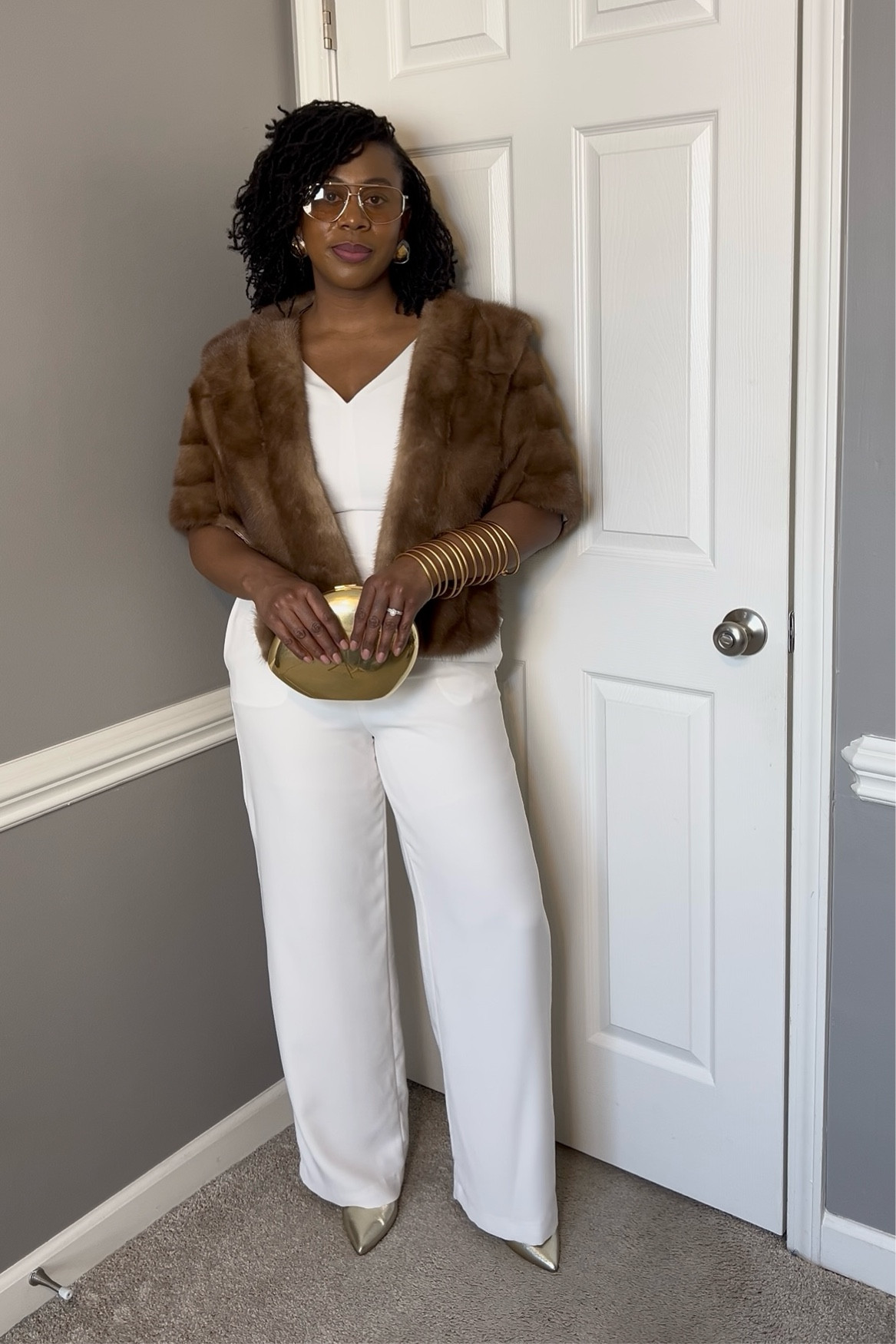 Styling a fur stole with a cream jumpsuit.

#LTKMidsize #LTKStyleTip #LTKSaleAlert