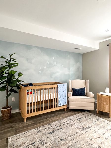 ✨NURSERY DETAILS✨
• crib: Namesake Marin with Cane 3-in-1 convertible crib in ‘honey/honey cane’ finish 

• glider: Storkcraft Serenity Upholstered Swivel Glider with USB Charging Port in ‘Ivory’

• side table: Portola Hills Woven Accent Table Natural - Threshold (designed with Studio McGee)

#nursery #nurserydetails #babyboynursery

#LTKbaby #LTKhome #LTKfamily