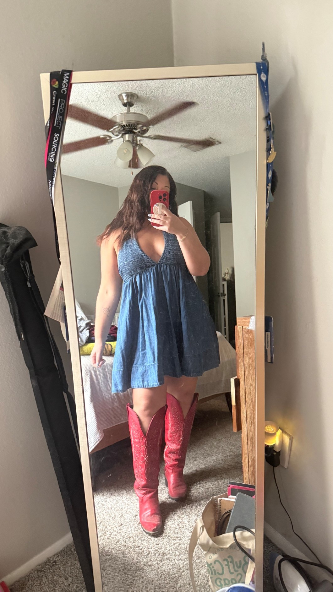 Denim dreams and a pop of red ❤️ This babydoll dress is the perfect throw-on-and-go piece for spring and summer—lightweight, flattering, and so easy to style. Paired it with my favorite red boots for a fun western vibe! ✨ 

Wearing a size large in the dress and could definitely size down! 

#LTKMidsize #LTKootd #LTKgrwm