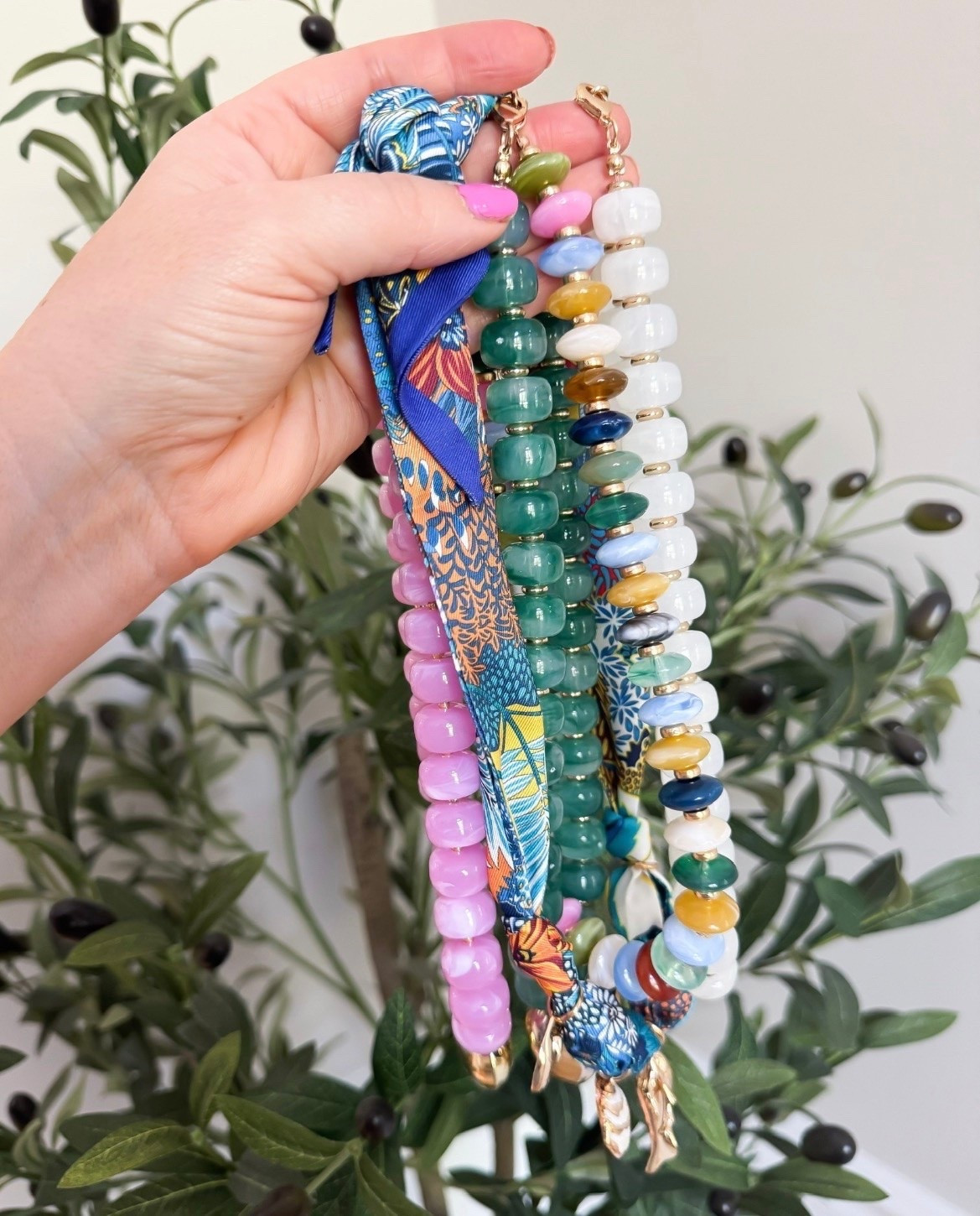 These colorful beaded necklaces are SUCH a fun way to dress up a simple summer outfit. I love mixing the bright beads with a graphic tee, basic tank, or swimsuit cover up for an easy pop of color that makes the whole look feel more styled.

colorful jewelry, beaded necklace, statement accessories, summer accessories, layered necklaces, colorful fashion finds, vacation accessories, trendy jewelry, resort style, boutique accessories, beach vacation style, fun summer outfit ideas, lovelylifestyling

#LTKSeasonal #LTKOver40 #LTKootd