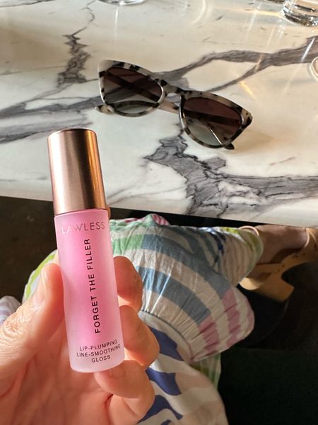 New favorite lip plumper lip gloss in Daisy Pink. And my sunnies are me trying a fun trend and I’m kind of loving it.