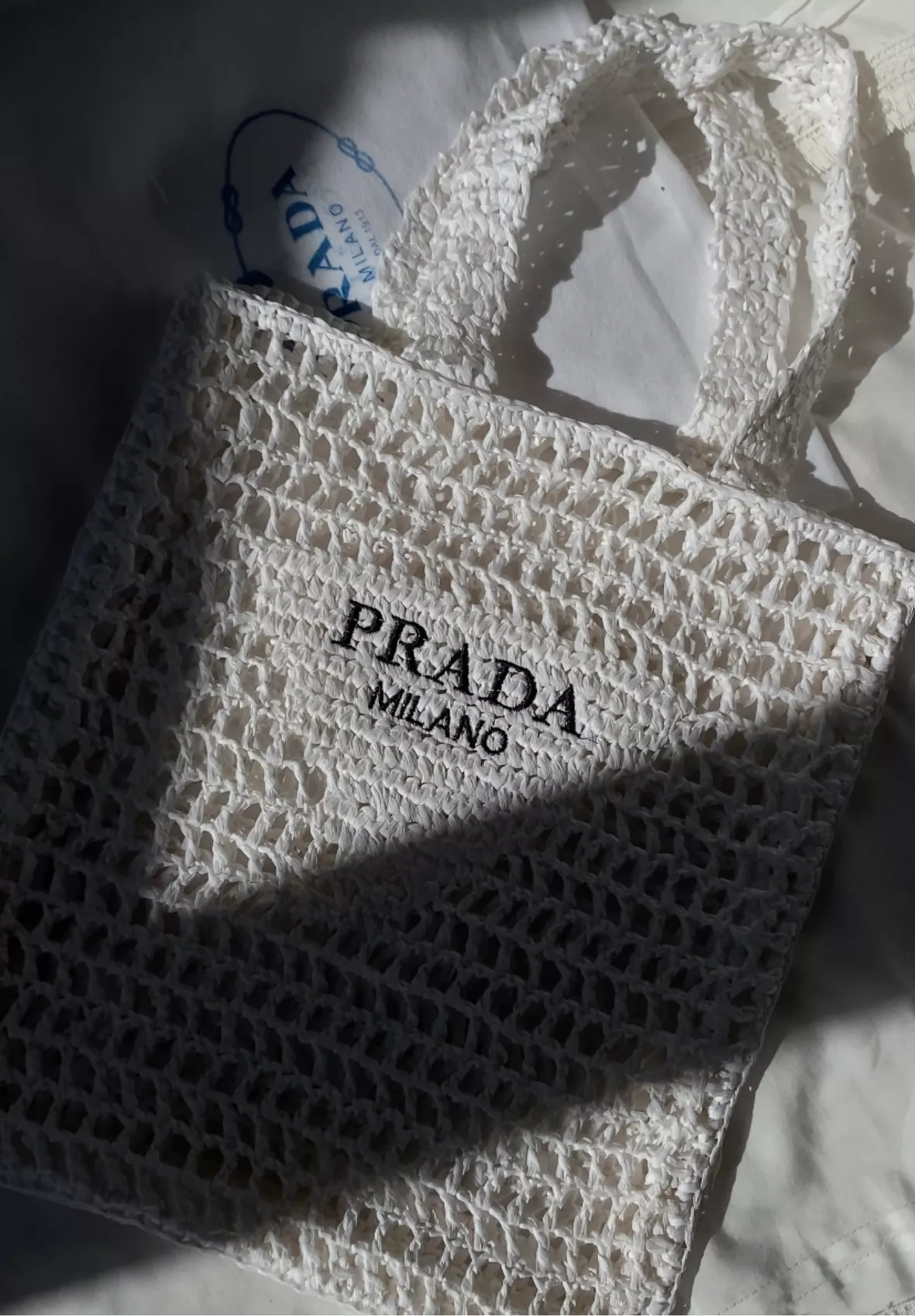 Prada raffia tote rep. It wasn't as pictured shown on  or like t