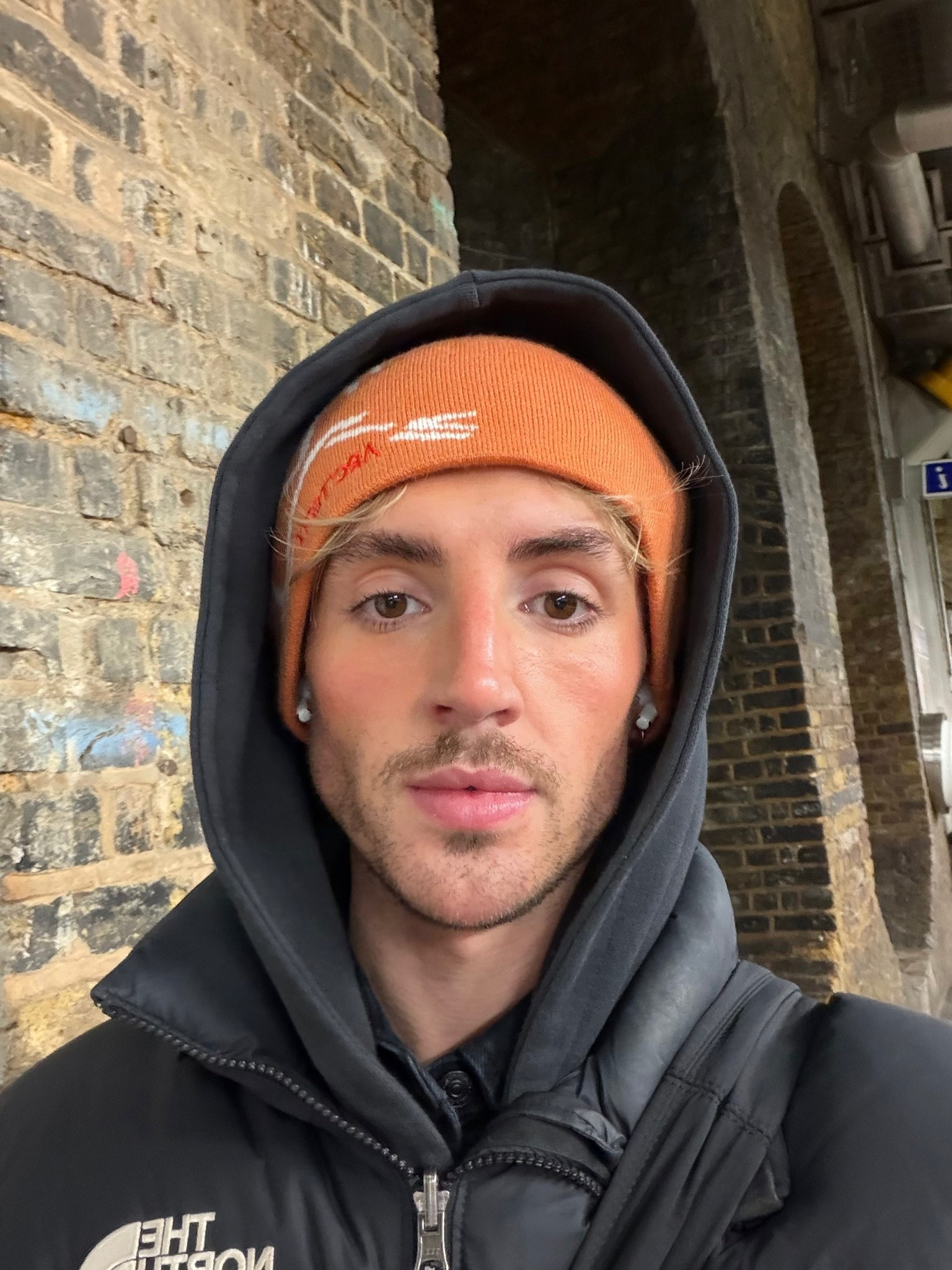 London Street style for winter, orange beanie and puffer jacket 

#LTKmens #LTKuk #LTKwinter