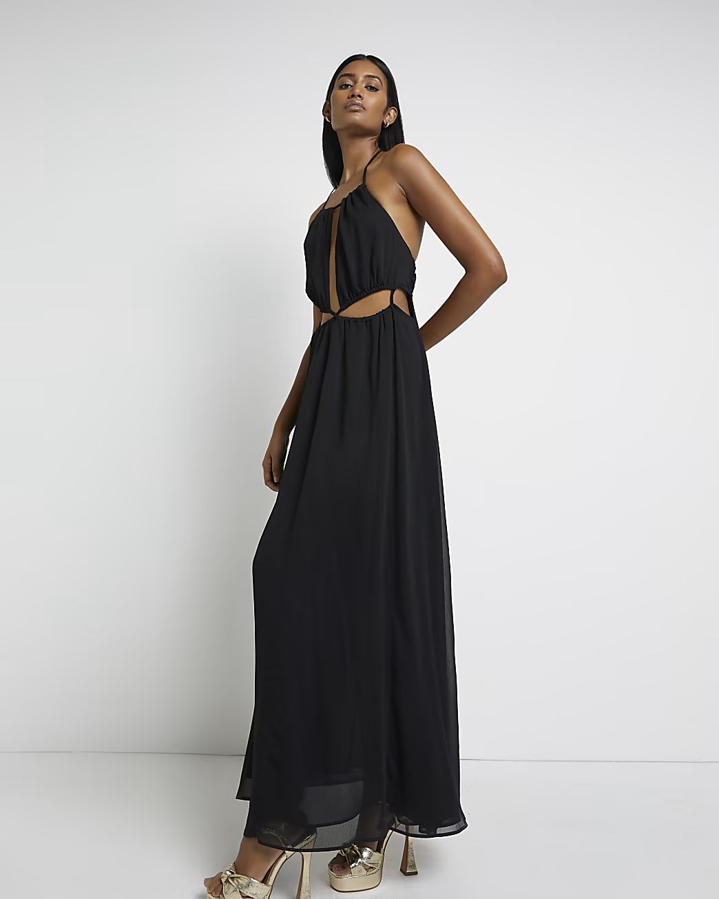 Black cut out maxi dress | River Island (UK & IE)