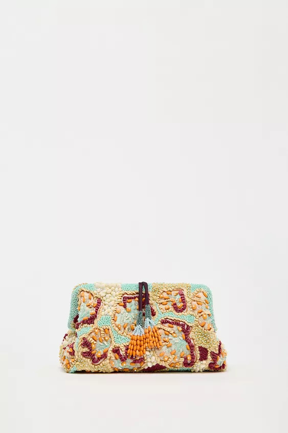 Clutch bag with beaded exterior. Removable chain strap. Interior zip pocket. Magnetic clip and lo... | Zara US