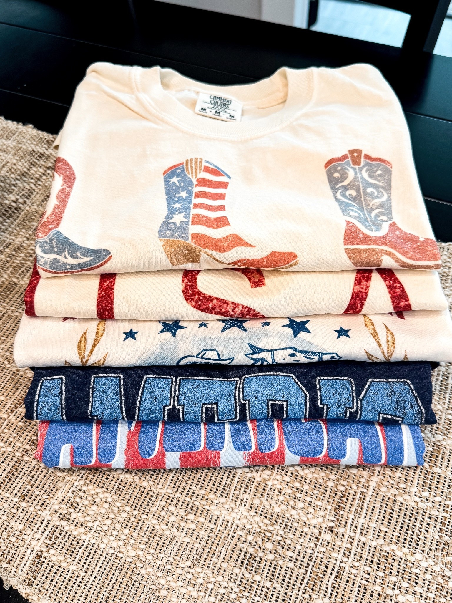 BUY 3 get one FREE! 
Memorial Day + 4th of July outfits are officially loading. I grabbed a few more patriotic graphic tees for summer and I’m OBSESSED! From vintage Americana vibes to cute cowboy boots and bold USA graphics, these tees are perfect for BBQs, lake days, fireworks, concerts, rodeos, and all the red, white & blue moments ❤️🤍💙 Bonus: they’re comfy and look adorable styled with denim shorts, biker shorts, or layered with a flannel for those cool summer nights!

#PatrioticStyle #FourthOfJulyOutfits #MemorialDayStyle #GraphicTees #USAStyle #AmericanaFashion #CountryConcertOutfit #WesternStyle #SummerStyle #PatrioticOutfit #CowgirlStyle #RedWhiteAndBlue #OOTD #CasualSummerStyle #LTKFashion #AmazonFashionFinds #TrendyStyle #ComfortColors #VintageGraphicTee #SummerOutfits

patriotic graphic tee • 4th of july shirt • memorial day outfit • americana graphic tee • western patriotic shirt • usa tshirt women • country concert outfit • cowgirl graphic tee • comfort colors tshirt • vintage patriotic tee • red white and blue outfit • summer graphic tshirt • oversized patriotic tee • casual summer outfit • patriotic fashion women • western summer style • cute july 4th outfit • trendy graphic tees • patriotic cowboy boots shirt • summer bbq outfit @Mountain Moverz

#LTKootd #LTKSaleAlert #LTKOver40