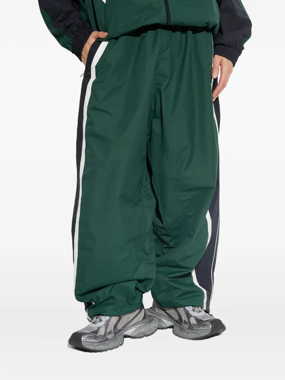 VETEMENTSstripe logo track pants | Farfetch Global