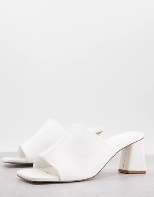 ASOS DESIGN heeled mules in white in faux leather | ASOS (Global)