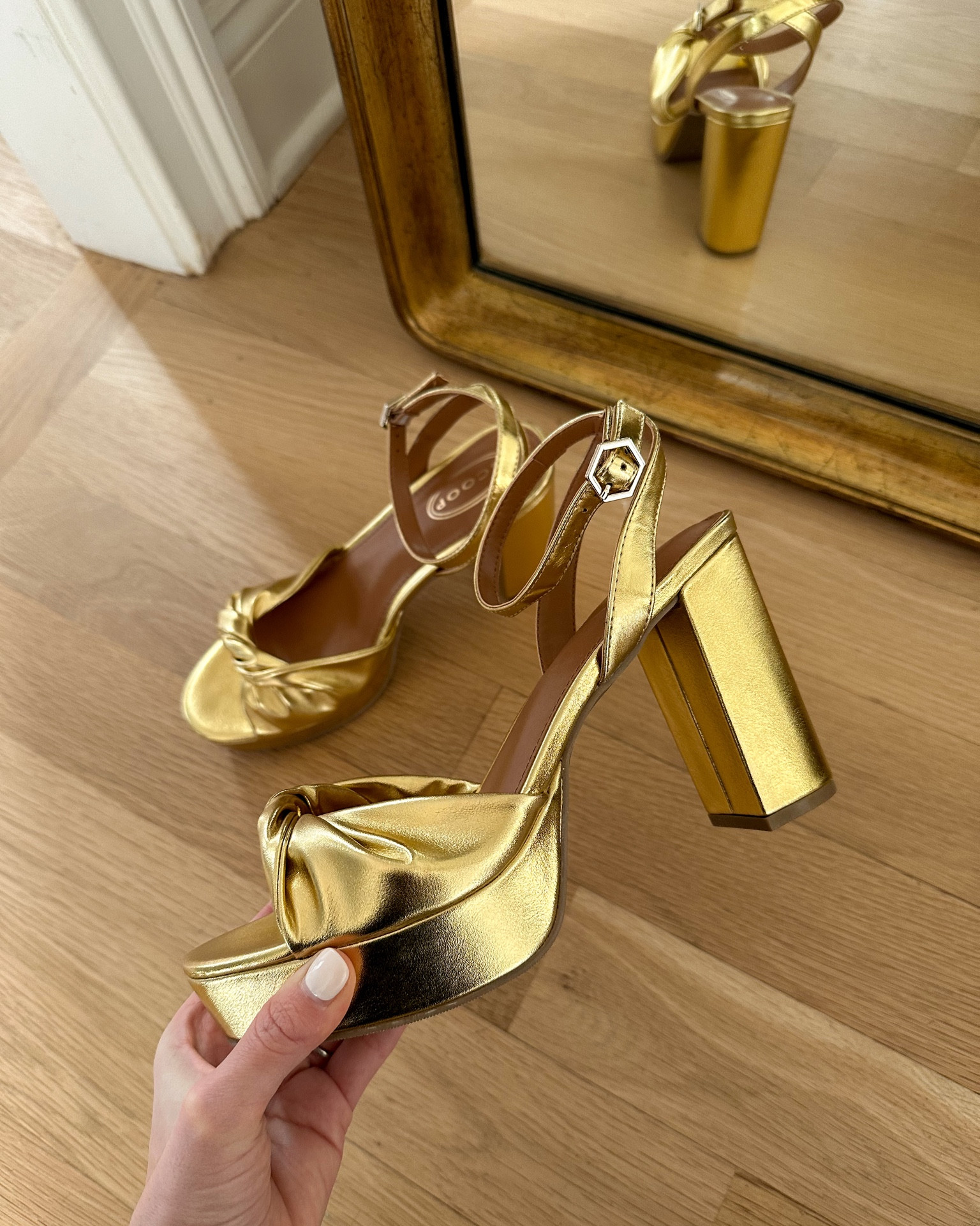 Kat Jamieson shares gold platform heeled sandals. 

#LTKshoecrush #LTKHoliday #LTKfindsunder50